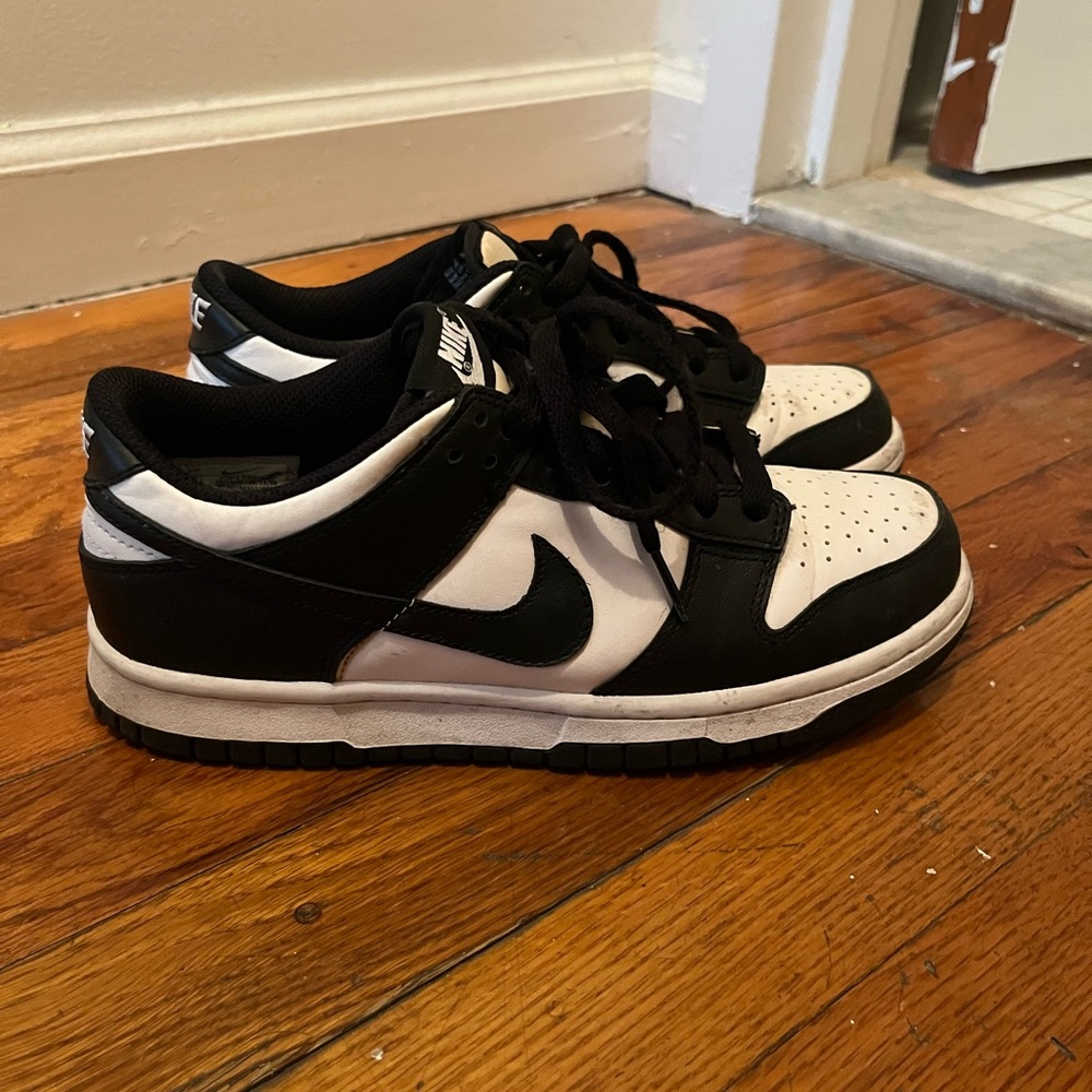 White and black Nike low dunks